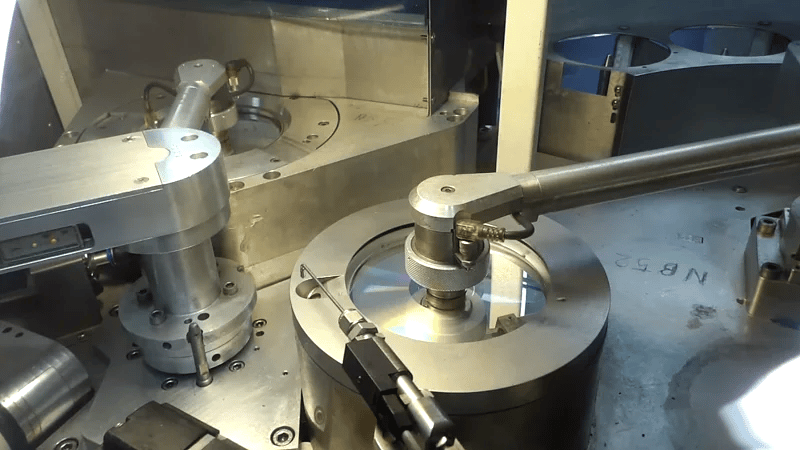 Gloss lacquer station within a CD replication machine at Alpha Duplication